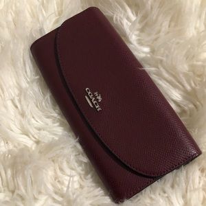 Coach wallet with animal print on the inside flap